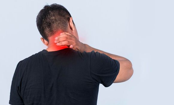 Neck pain and stress concept, Close up of man with neck pain, man with neck muscle pain, a man with neck pain on isolated background.