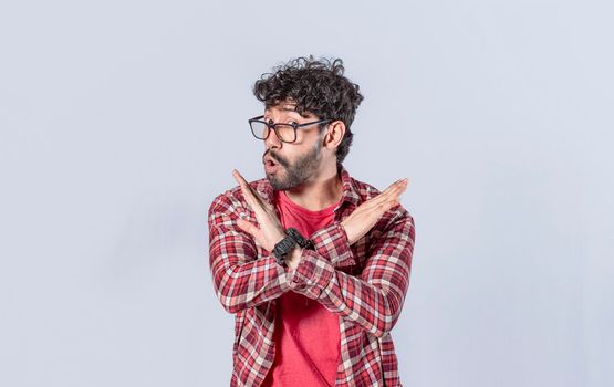 man without doing or stop sign isolated, a man crossing his arms with rejection expression, concept of man rejecting