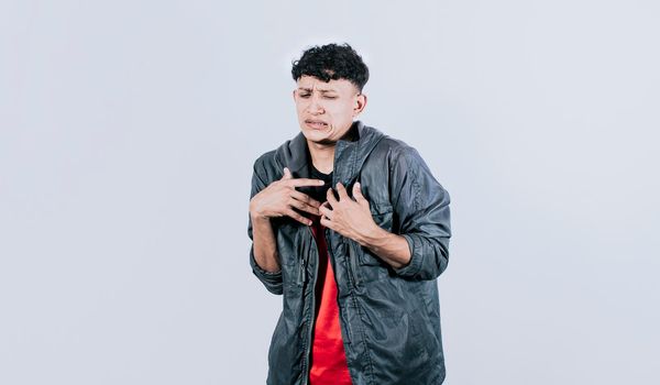 Puzzled people on isolated background, face of a puzzled and skeptical guy on isolated background