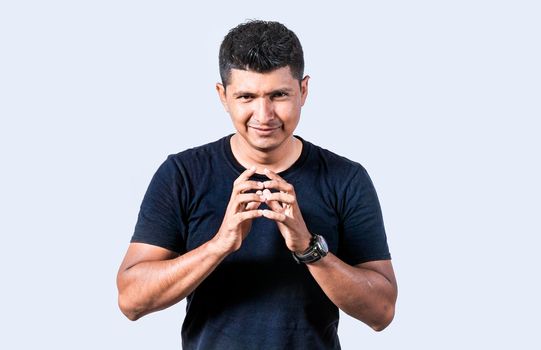 Person rubbing his hands planning something, Cunning man rubbing his hands on isolated background, concept of cunning man planning something