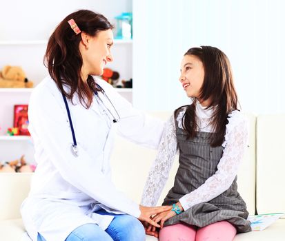 The little girl with her mother played in doctors.