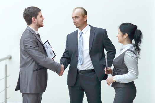 close up.businessman handshake with business woman.