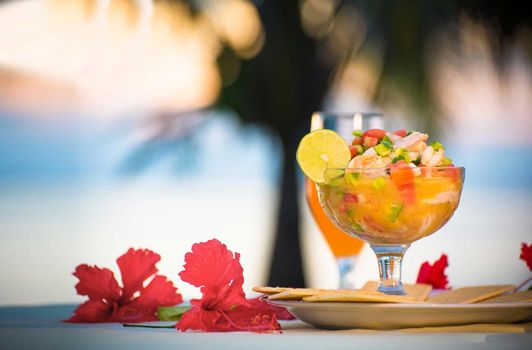Nicaraguan food, shrimp ceviche with fruit cocktail drink, Nicaraguan palate