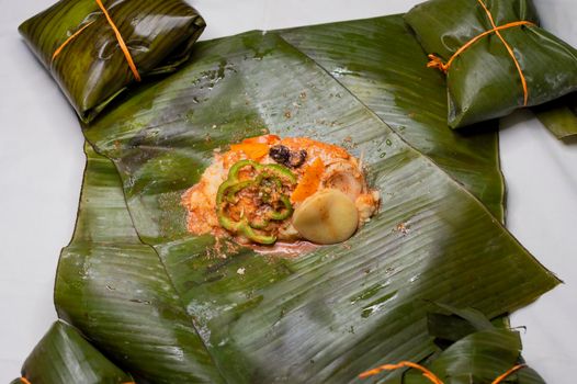 Preparation of the nacatamal, close up of the elaboration of a Nicaraguan nacatamal