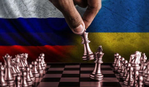 Russia vs Ukraine concept, Russia vs Ukraine chess pieces, Russia vs Ukraine political conflict, Russia vs Ukraine chess piece