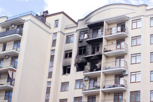 consequences of russian war crimes. destroyed houses in irpin city, ukraine. mortar shell hit someone home during war.