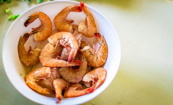 cup of raw shrimp on white background, raw shrimp on white background