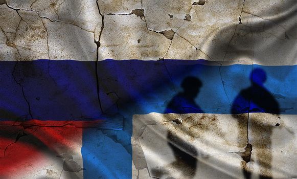 Concept of war between Russia and Finland, silhouette of soldiers on russia vs finland flag, Russia vs Finland flag, cracked wall with russia and finland flag, confrontation between russia vs finland