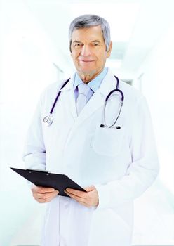 Portrait of friendly male doctor smiling