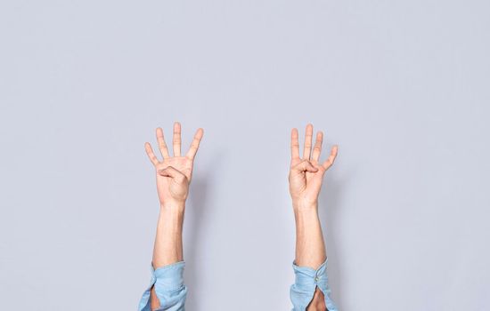 Man hands counting four, fingers counting four, hand fingers counting four on isolated background, countdown