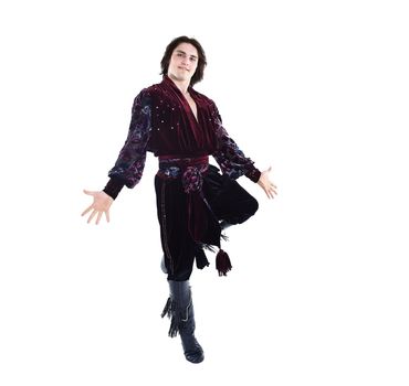 male dancer.Gypsy dance.jumping photo.a dance show.the national costume.ethnic culture.the photo with blank space for text