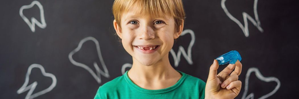 BANNER, LONG FORMAT Six-year old boy shows myofunctional trainer. Helps equalize the growing teeth and correct bite, develop mouth breathing habit. Corrects the position of the tongue.