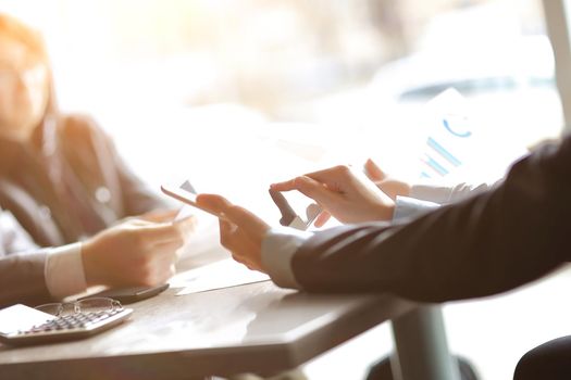 close up. the business team works with financial documents. people and technology