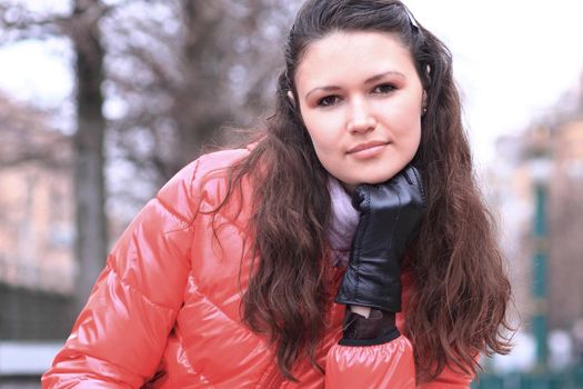 close up.beautiful young woman on the background of a winter city.