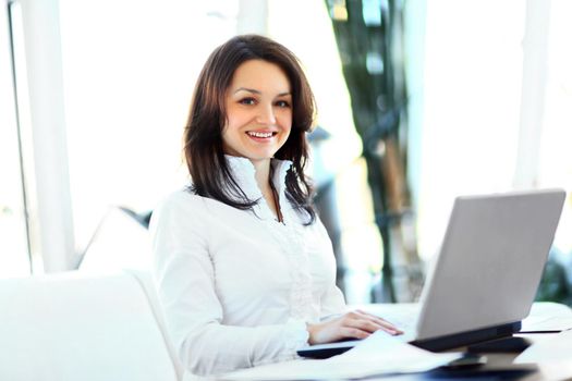 Nice business woman in the office.