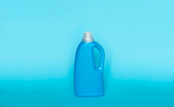 Blue plastic bottles of cleaning products. Laundry container, merchandise template