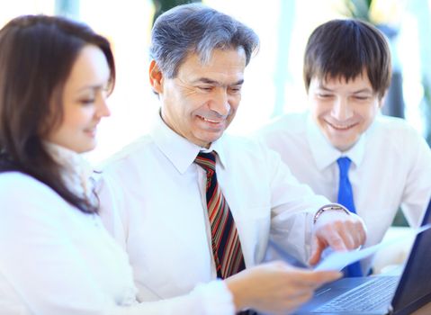 Business team working on their business project together at office