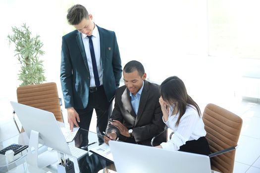 employees working with financial documents in the office.office life