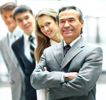 Group of business people with businessman leader on foreground