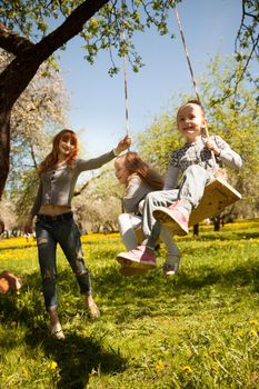 Riendly, cheerful family having a picnic.