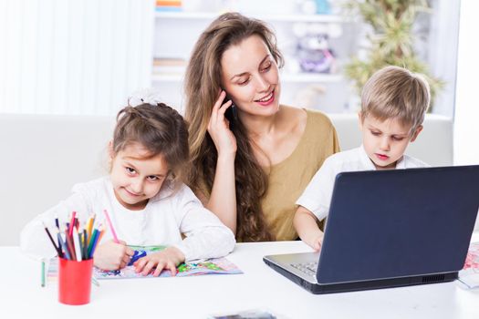 Kind, happy family relaxing at home.