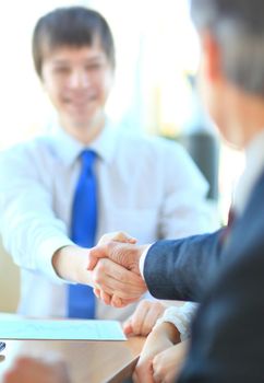 Business people shaking hands, finishing up a meeting