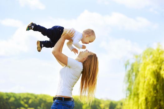 happy mother and son on a walk on a Sunny day