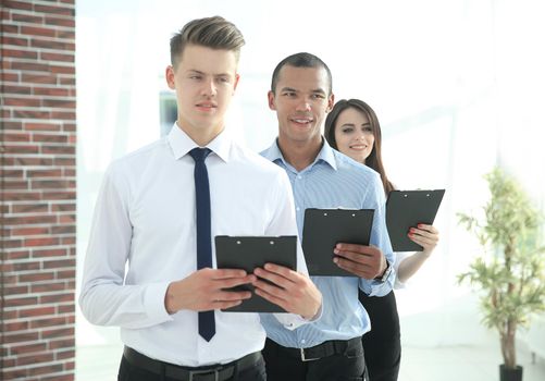 portrait of an Executive business team on office background .photo with copy space