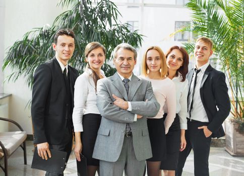 businessman and successful business team in the office after the conference