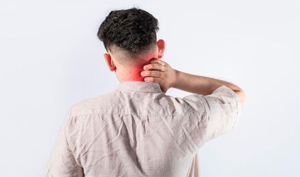 Neck pain and stress concept, man with neck muscle pain, Close up of man with neck pain, a man with neck pain on isolated background.