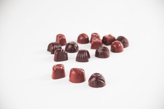 close up.set of chocolates isolated on white.photo with copy space.