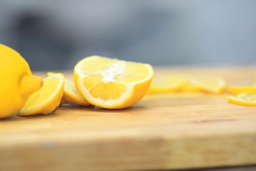 close up.cook the orange slices on a wooden Board.