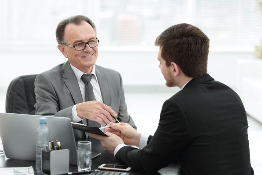 close up.business people talking at a Desk.meetings and partnership