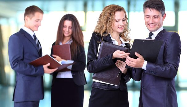 Business team working on their business project together at office