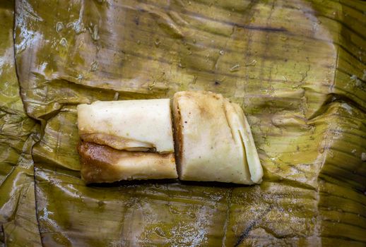 Nicaraguan stuffed tamale with copy space, Nicaraguan food stuffed tamale