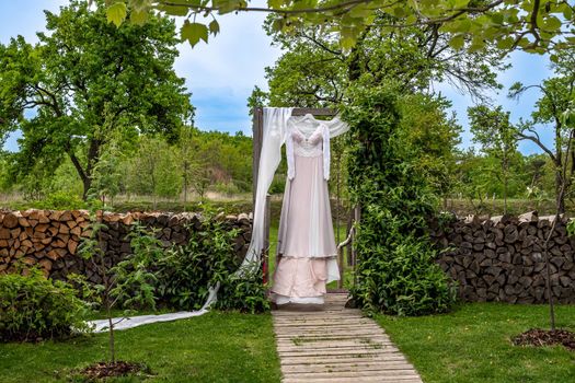 wedding dress of the bride in the garden.