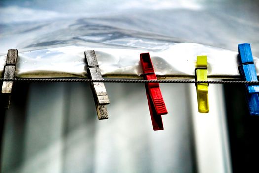 Colored clothespins on a clothesline in Lisbon, Portugal