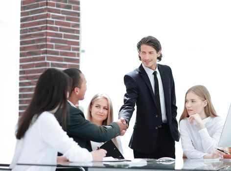 handshake Manager and customer in a modern office.photo with copy space