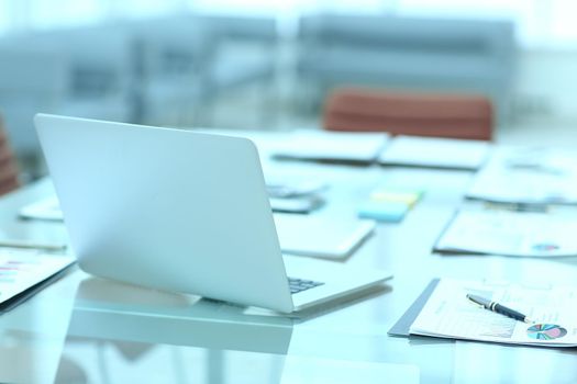 closeup.open laptop on the Desk of a businessman.photo with copy space