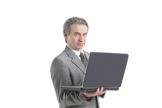 close up.adult businessman looking at laptop screen.isolated on white background.