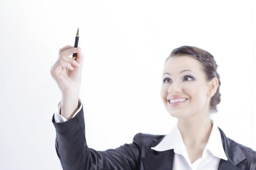 successful business woman showing with pencil upwards at copy space.isolated on a white background