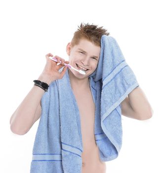 young man with towel and toothbrush.isolated on white background