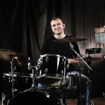 musician rehearsing on the drums. youth and Hobbies.photo with copy space
