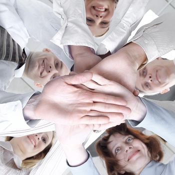 closeup.bottom view.successful business team.isolated on white background