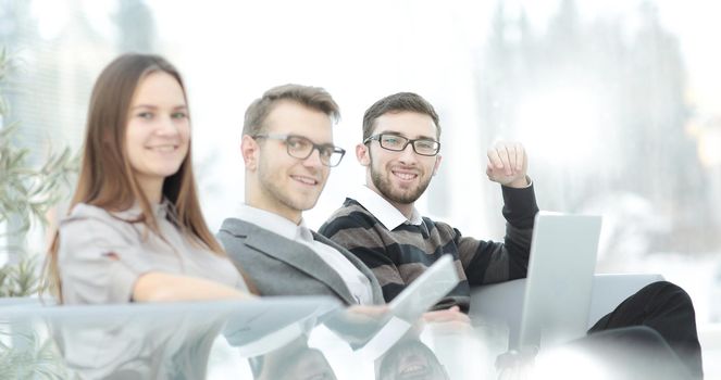 close up.business colleagues in the workplace in the office.photo with copy space