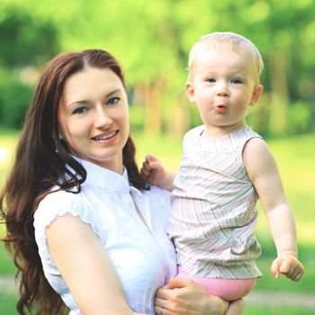 Happy mother and daughter laughing together