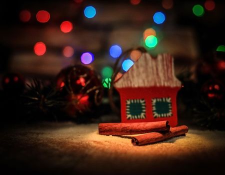 Christmas decorations and cinnamon sticks on a festive background.photo with copy space.