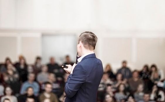 speaker at business conferences.business training and education.the photo has a blank for the text.