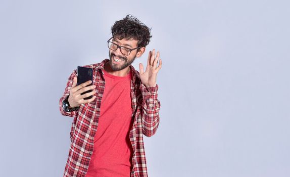 Man making video call, positive guy making video call, video call concept