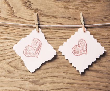 Love hearts on wooden texture background, valentines day card concept